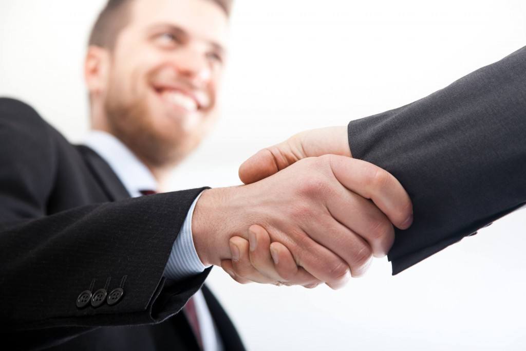 bigstock-Two-businessman-shaking-hands-26976686